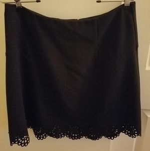 Black skirt with laser cut flowers